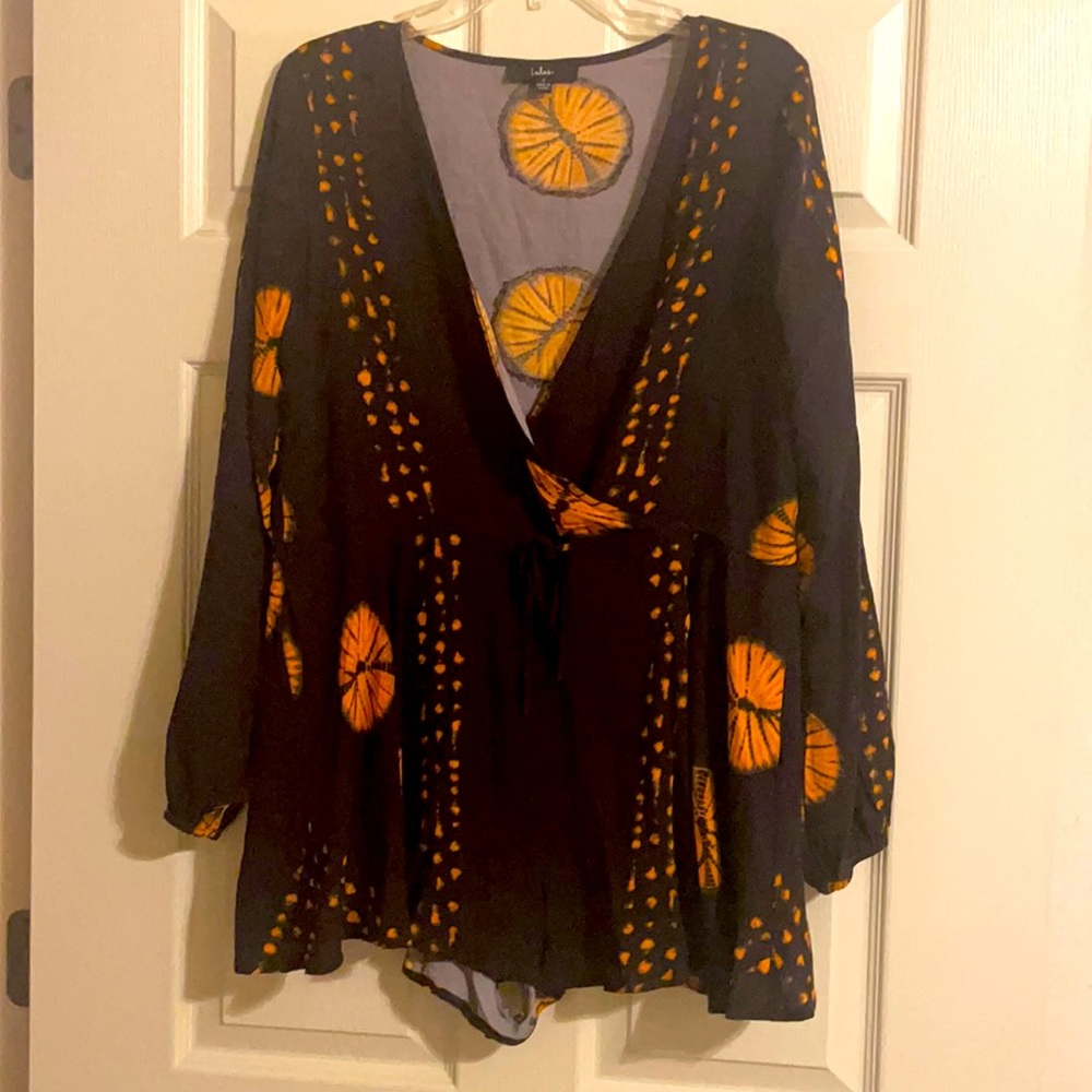 Black and Orange Romper from Lulu’s